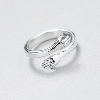 Silver hug ring