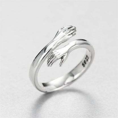 Silver hug ring